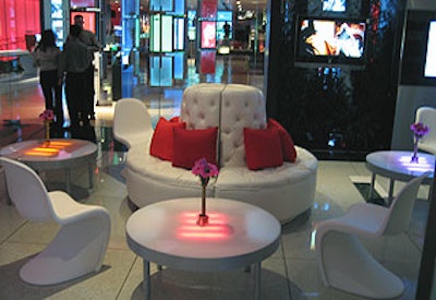 White circular sofas dotted a more mod area set up for the party.