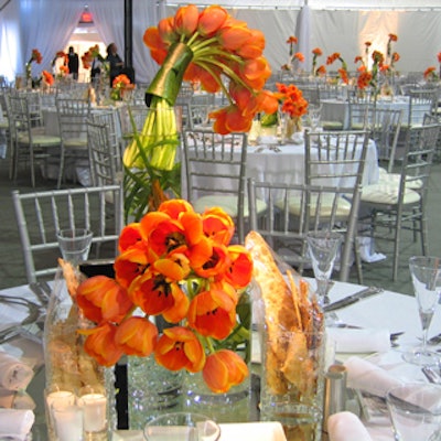Vibrant orange flower arrangements from Church Street Florals and silver chiavari chairs from Chair-man Mills spiced up the dining space during Mount Sinai Hospital's annual gala fund-raiser at Roy Thomson Hall.