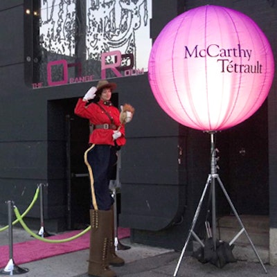 A stilt walker in a Canadian Mountie costume from Stop Thyme Productions greeted arriving guests.