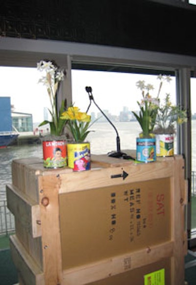 More art packing crates—topped with Diaz's cans—served as a podium.