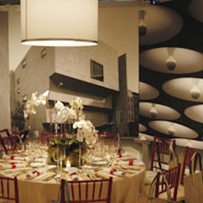 The Whitney's American Art award dinner was held off-site this year, but the tent it occupied was dominated by a large mural of architectural images of the building.