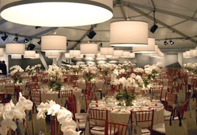 Lampshades filled the dinner tent, and echoed the circular lights of the museum's lobby, which were featured amid the wall mural images.