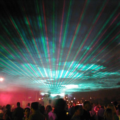 Lasers projected from the DJ booth created a rooftop effect above the guests.