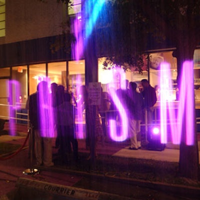 Two water screens at the entrance displayed PRISM's logo.