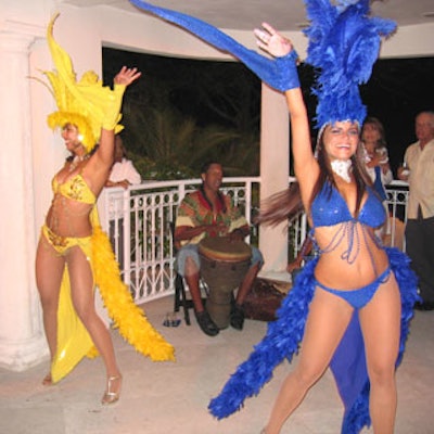 Hot Jam also provided dancers who gyrated to the music in brightly colored showgirl costumes.