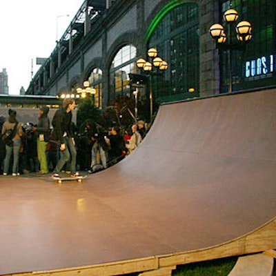 Skateboarders performed for arriving guests on a ramp built by Brooklyn-based Coda Skateboards.
