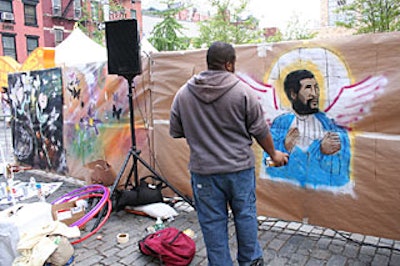 New to the carnival was a fence covered in brown paper for kids to graffiti.