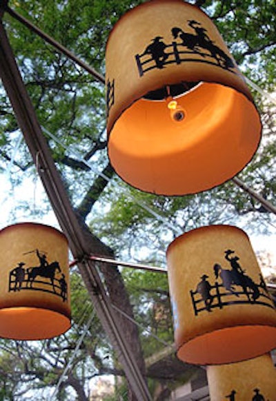 Custom-screened lampshades featured cowboys on horseback in silhouette.