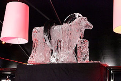 Atop the bar's center shelves stood an ice replica of Robert Rauschenberg's famous artwork of a long-haired goat with a tire around its middle.