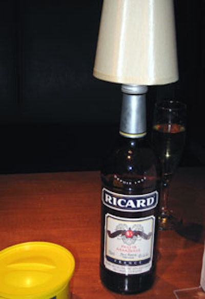 Event Energizers fashioned battery-operated minilamps out of Ricard bottles and placed them atop tables throughout the venue.