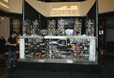 Servers poured Belvedere martinis at an ice bar by Carving Ice.