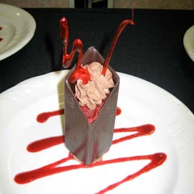 The chocolate dessert with red horn-like sugar sticks resembled storybook character Maleficent.