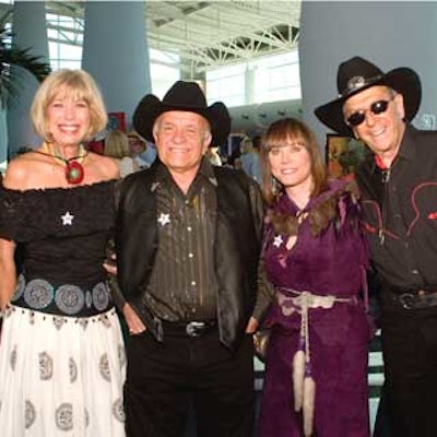 Ball attendees dressed up as cowboys and girls.