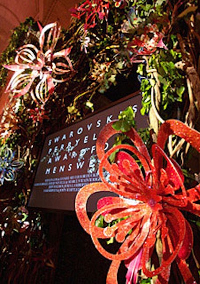Artist Tord Boontje created a crystal flower motif blended with ivy for the archway decor.
