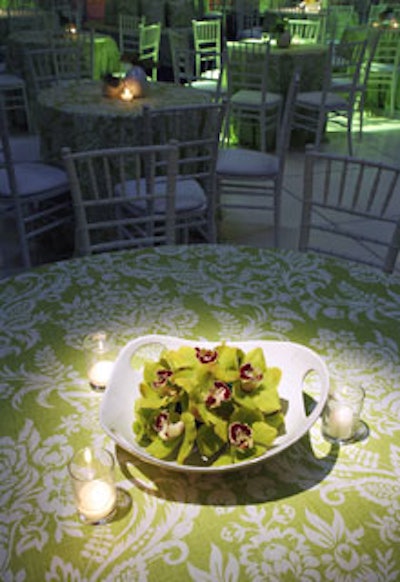 Butchkavitz placed green orchids in bowls on tabletops.