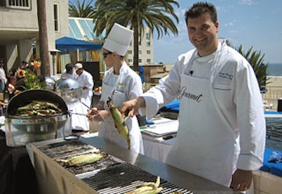 The Loews hotel and Ocean & Vine executive chef Gregg Wangard grilled spice-rubbed hangar steak and corn on the cob.