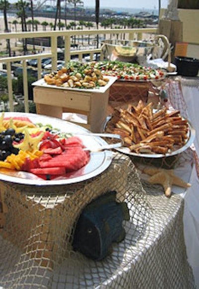 The hotel arranged an array of salads and side dishes on several nautical-theme