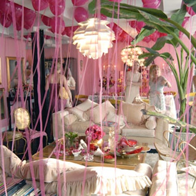 Designer Betsey Johnson launched her new signature fragrance in her apartment, which was festively filled with hot pink balloons with streamers.