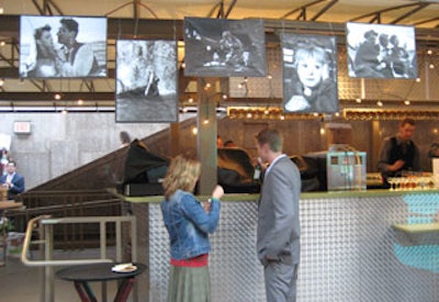 Black and white stills from old Italian films hung from the bar.