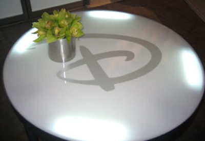Illuminated tables from Lounge 22 were appliquéd with large Disney 'D' monograms.