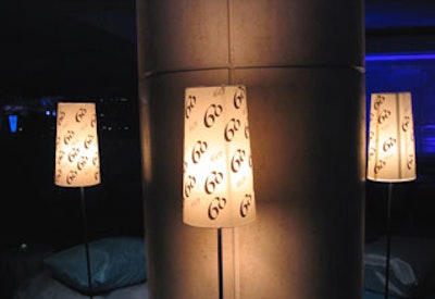 Susan Edgar designed the '60' logo for custom lampshades and votive holders dispersed throughout Rockefeller Center.