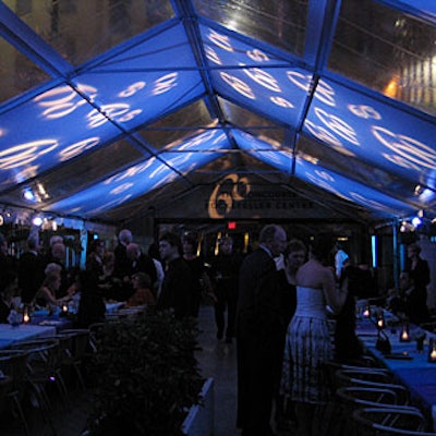 Lighting designer Bentley Meeker projected a '60' logo onto the ceilings of tents flanking the Rink Bar at Rockefeller Center to commemorate the 60th annual Tony awards.