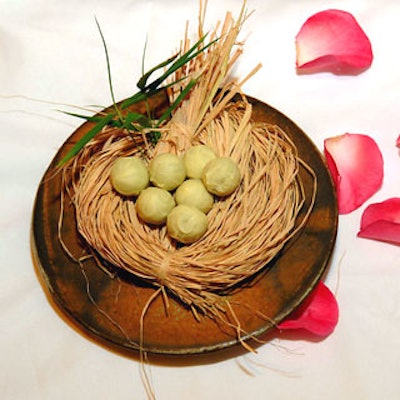 The Amore Pacific green tea chocolate truffles arrived in a raffia nest on a Song Taesik plate.