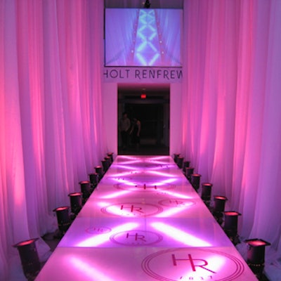 Westbury National Show Systems lit the Holt Renfrew-sponsored pink hallway with uplights and logo gobos.