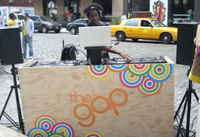 In New York, DJs and celebrities including DJ Ruckus (pictured), Lindsay Lohan, and Lydia Hearst spun music for the shoppers.