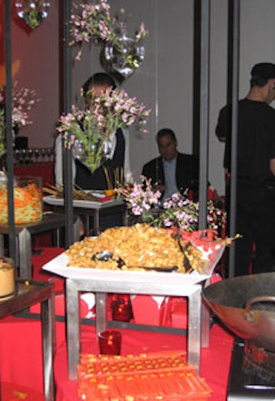 Vases full of pink flowers hung above Canard's hearty Chinese food buffets.