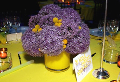 Centerpieces on the 404 dining tables were giant purple alliums and yellow crespidia.
