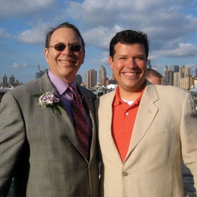 Richard Aaron and Pfizer Inc.'s Sam Gonzalez, MPI of Greater New York's Planner of the Year, posed for pictures aboard the World Yacht in New York City.
