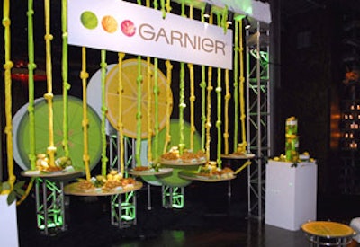 Larry Abel created a green- and yellow-hued Garnier Lounge, patterned on Garnier's green and yellow bottles.