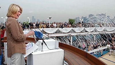 Martha Stewart, the ship's designated 'godmother,' officially christened the ship after winding a crank that released a bottle of champagne, which shattered on the boat's side and onto a blue carpet below.