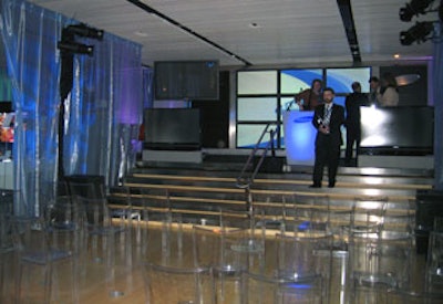 Transparent chairs filled the presentation area.