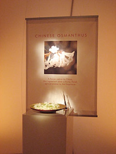 Pedestals displayed the scent's ingredients in large golden bowls.
