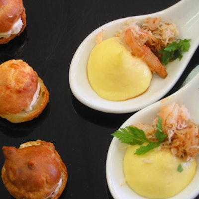 Gibson & Lyle Catering with Style created sweet corn custard spoons with British Columbian Dungeness crab and miniature steak sandwiches with Champagne Dijon sauce.