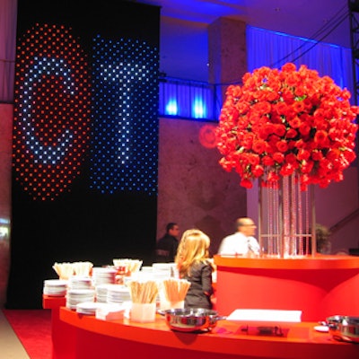 A massive display of red roses decorated the food station in the foyer.