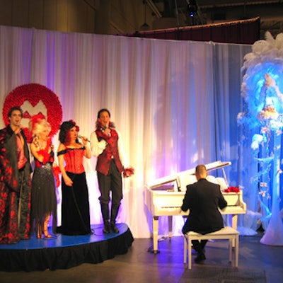 Opera Forte performed near the display of fashion designs from previous Fashion Cares galas.