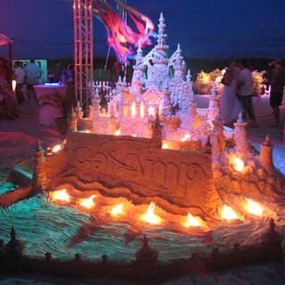 Sentinels of Sand finished sculpting this branded sandcastle on site.