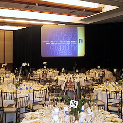 Screens throughout the dining room showed the organization's logo, as well as a special video (narrated by Sigourney Weaver) about the committee's work and the award winners.