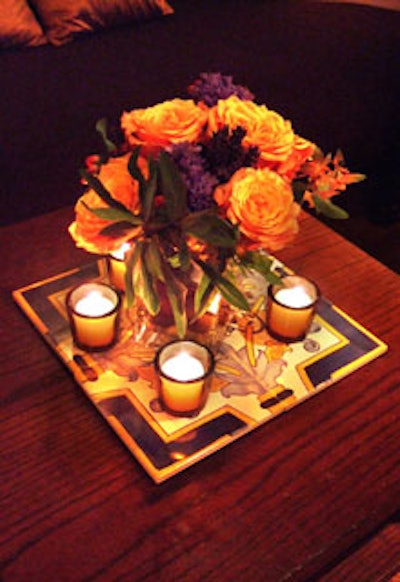 Small floral arrangements surrounded by scented votive candles sat atop Spanish tiles.