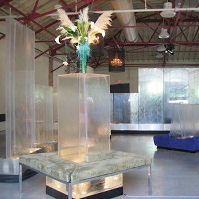 Solar Aquatics supplied rectangular water columns with lounge seating at Martini Club's Drinks Show, held at Muzik.