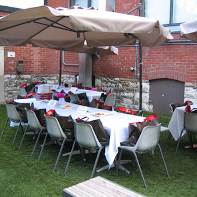 The outdoor V.I.P. space featured fake grass and country-club-style patio furniture.