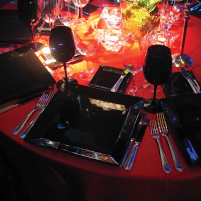 Chair-man Mills supplied red satin linens and black china and glasses.