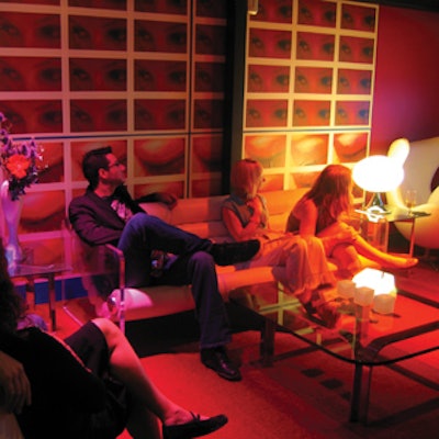 Guests relaxed in the V.I.P. lounge while watching the awards show on television monitors.