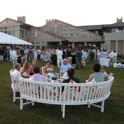 You can't see the earthmover still outside, but here's everybody on the still-wet sod at the Hampton Designer Showhouse.