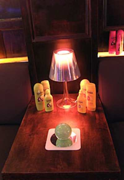 Magic 8-Balls with Sunsilk logos, as well as the new products, decorated small tables throughout the room.