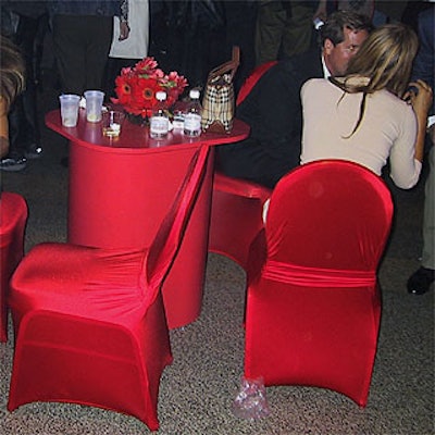Red chairs by Sculptchair added to the lively red decor.
