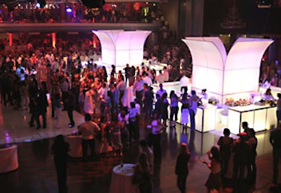 Russell Harris designed the event with towering light-up bars and furniture from Classic Party Rentals.